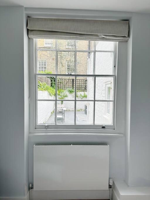Londwell, Luxe And Leaves, Chelsea Flat With Private Garden Appartement Londen Buitenkant foto
